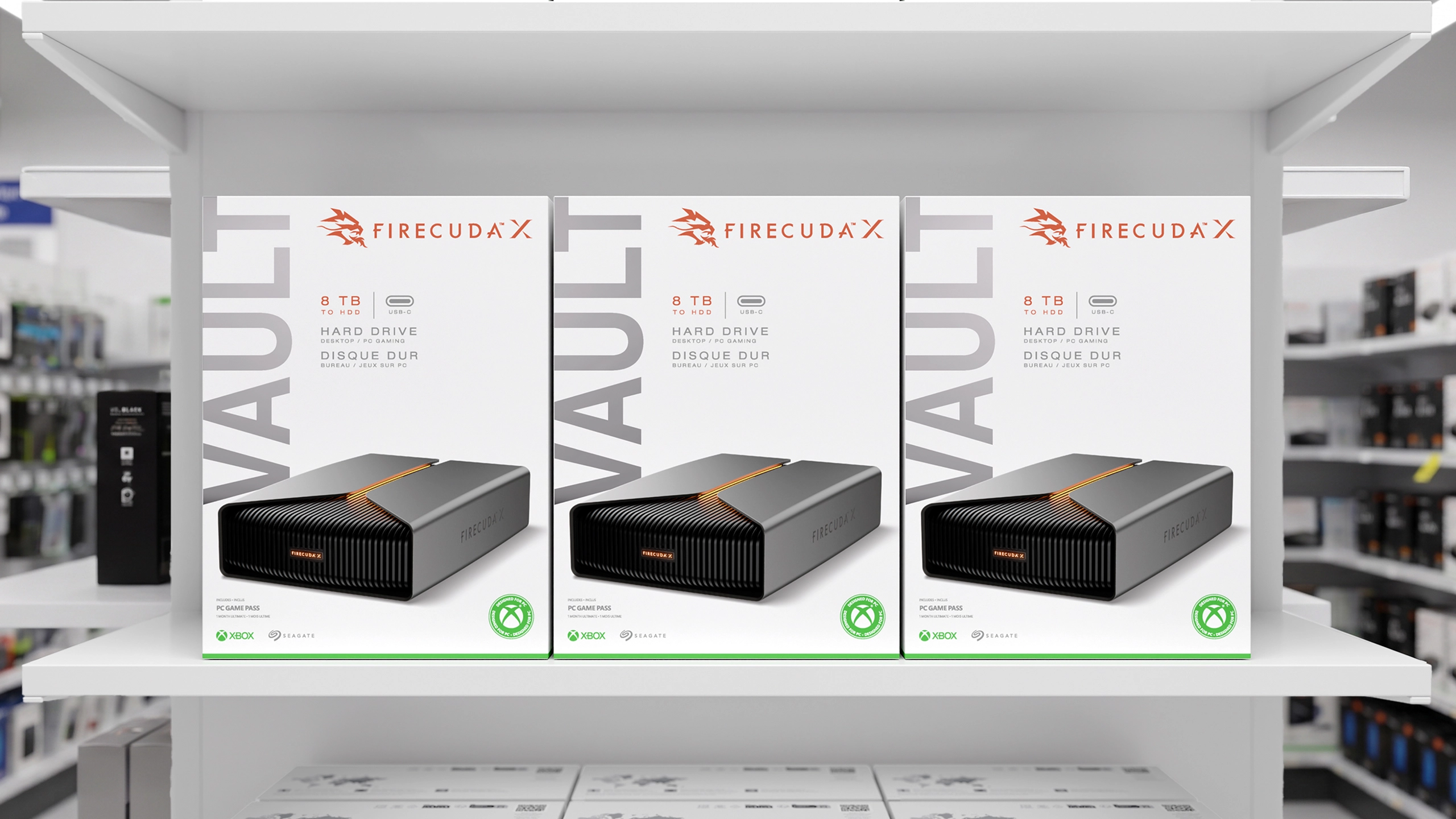 FireCuda X 8TB external gaming hard drive boxes on retail shelf.