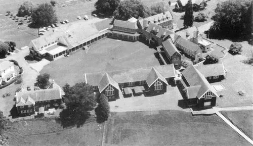 Aerial view of St. Peter's School campus, showcasing its inviting grounds and distinctive architecture. The image highlights the school's co-educational facilities and expansive outdoor space, reflecting its commitment to a well-rounded education and vibrant community.