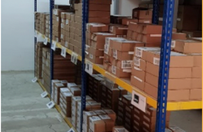 Image of a warehouse with stocks organised in shelves