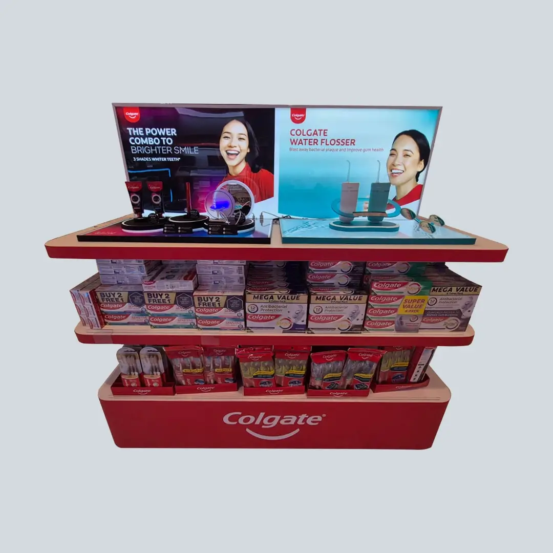 POSM/Display Sustaining Refresh Solutions_Colgate Gondola

A promotional display for Colgate products, featuring a variety of toothpaste and toothbrushes, with a focus on oral hygiene items. Two screens highlight products like the Colgate Water Flosser and special offers, set up in a vibrant red gondola display.
