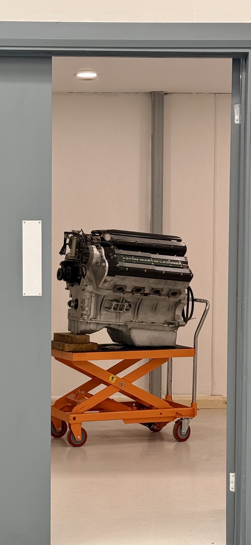 The Aston Martin 7.3 litre multi-valve V8 engine on a lifting trolley at Hutson Engineering Services
