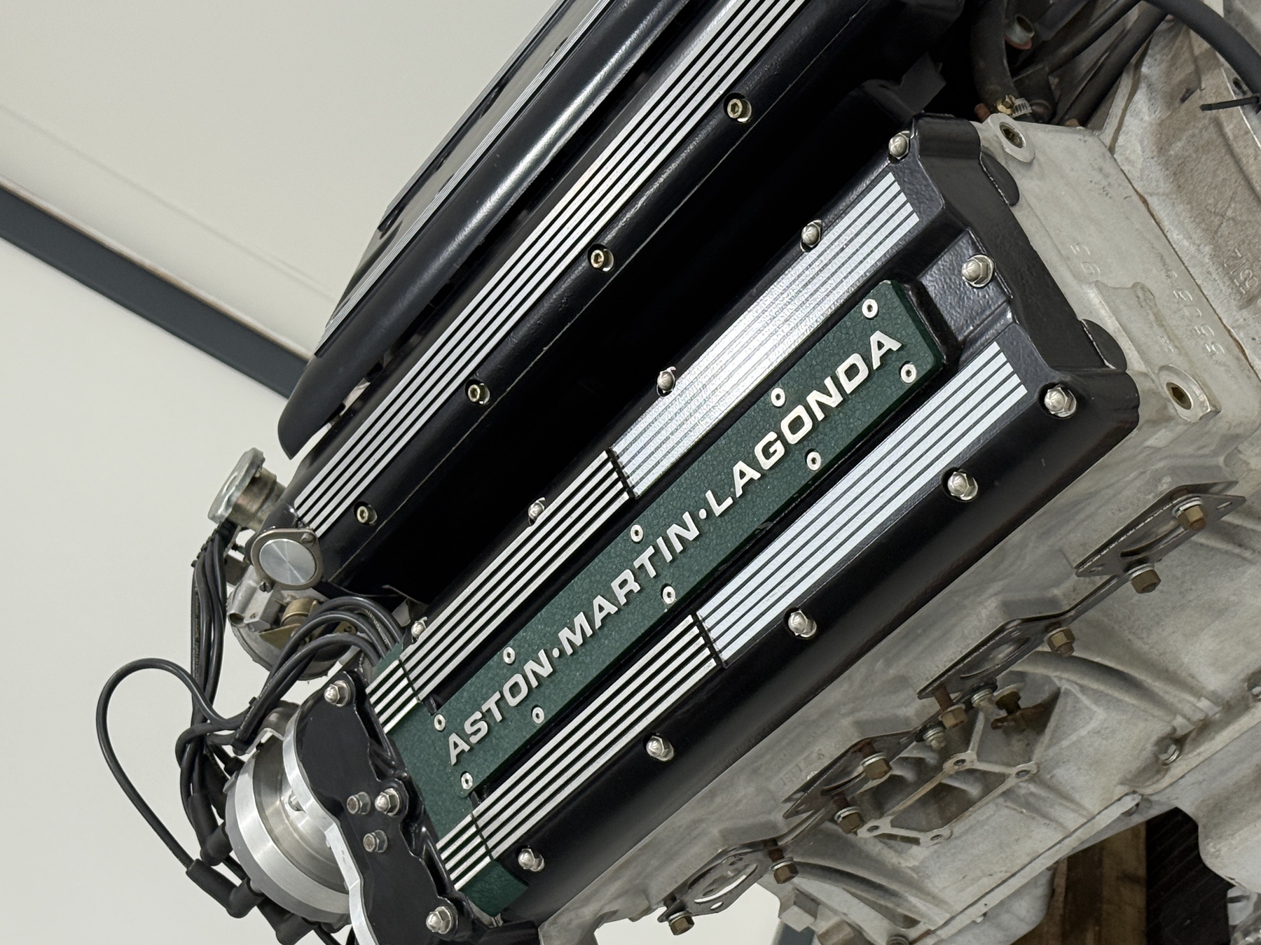 Close-up of the green and polished Aston Martin Lagonda cam covers on the 7.3 litre multi-valve V8