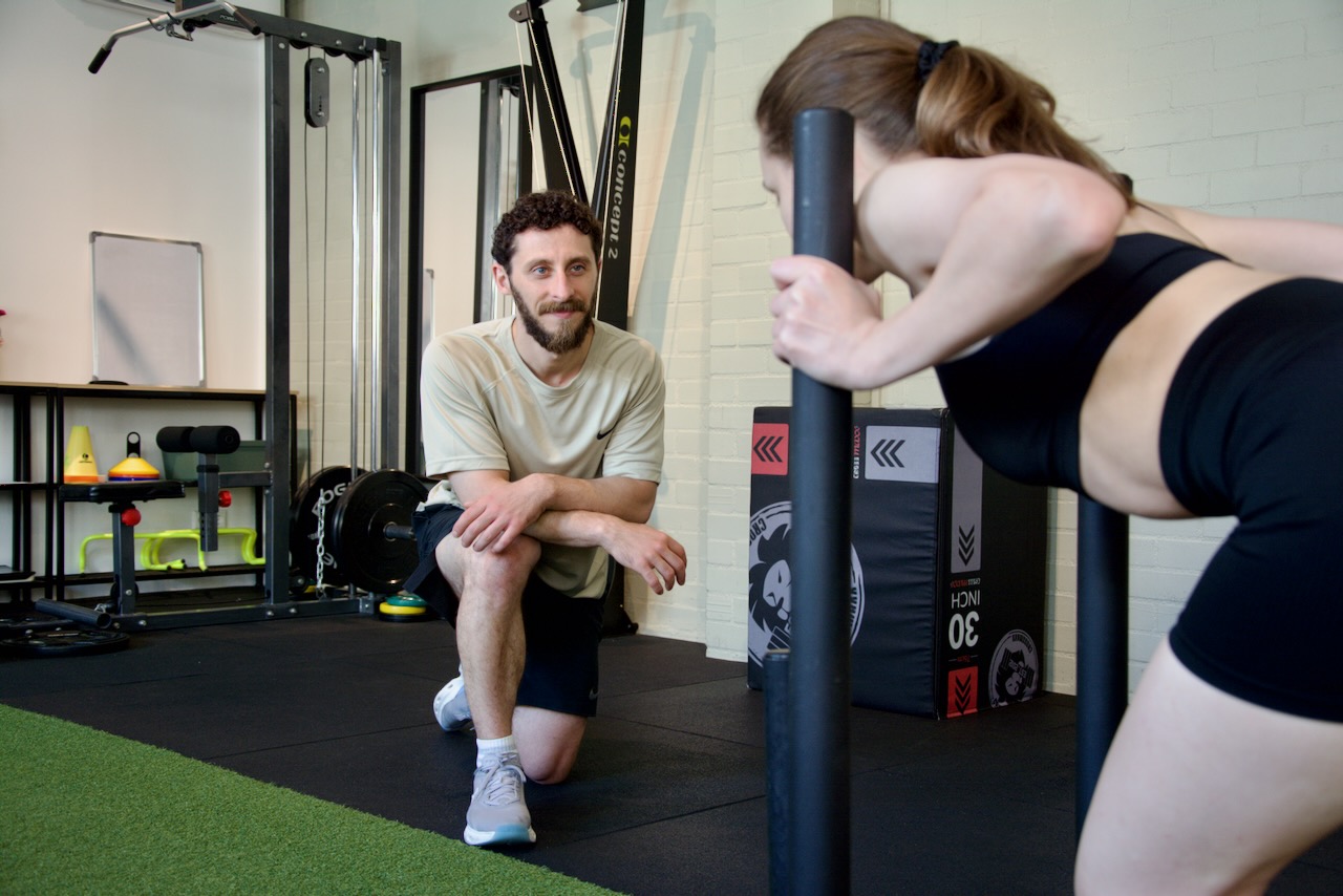 Alex, personal trainer, coaching client.