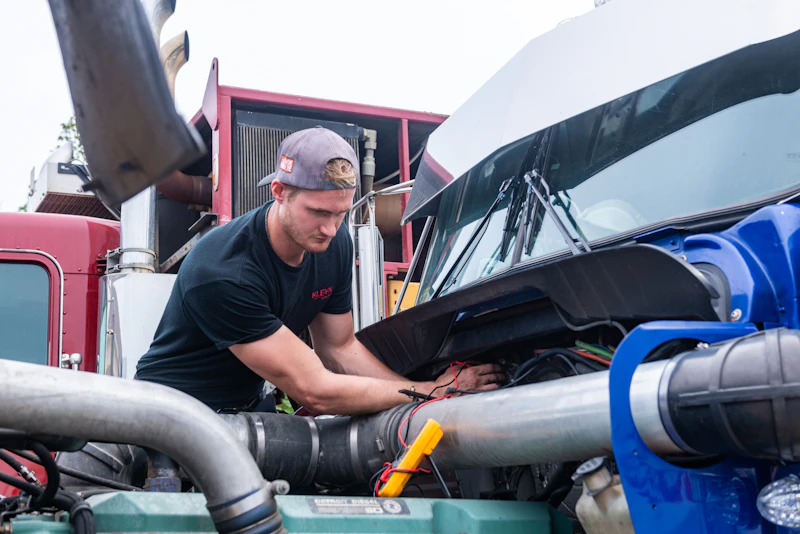 mechanic working on a truck