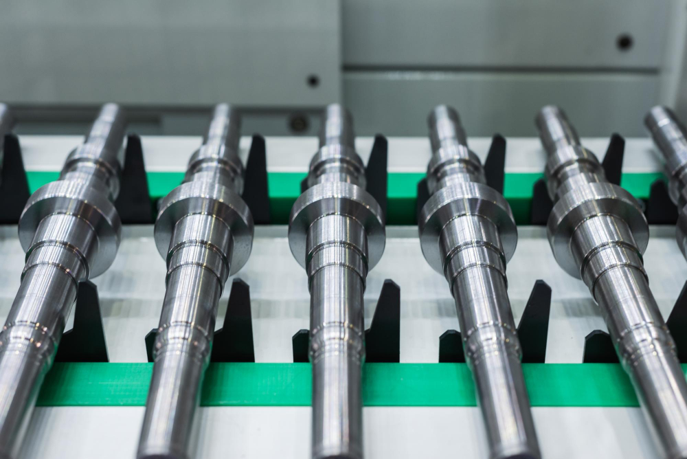 Automotive components aligned for high-volume production quality control.