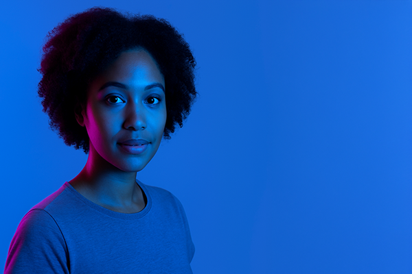 Portrait of Manuela, manufacturing engineer, representing process optimization with digital twin insights