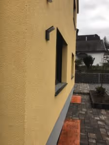 Außenputz Gelbe Wand | Laudani GmbH Bauunternehmung