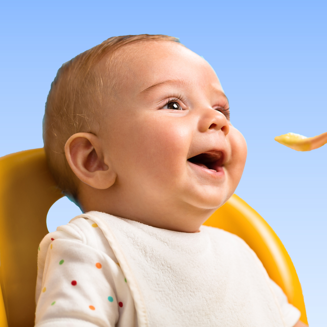 Image of baby eating baby food