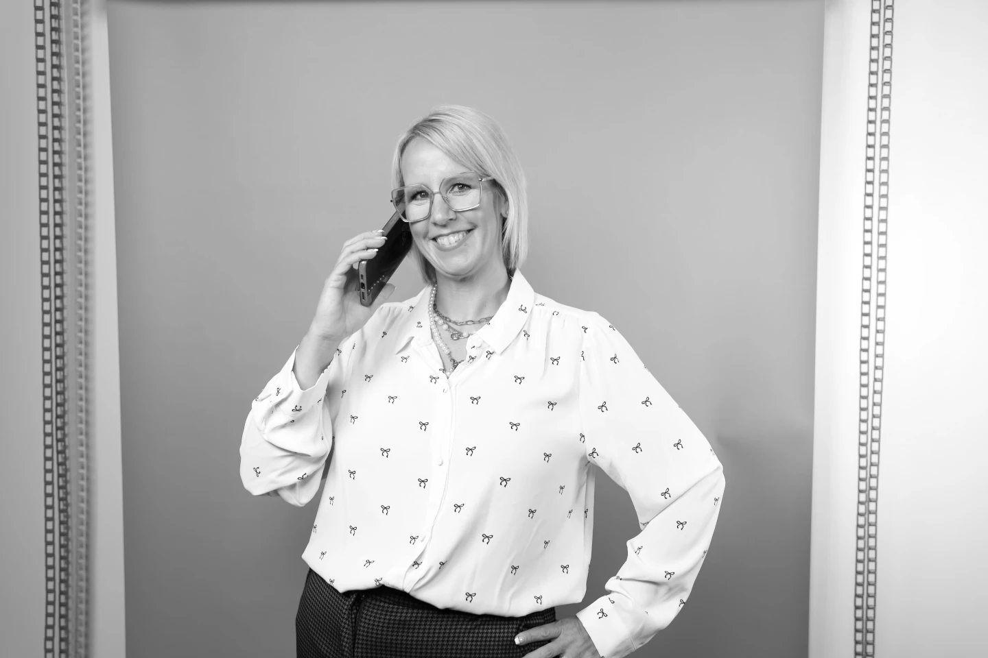 lindsey smiling with phone to her ear