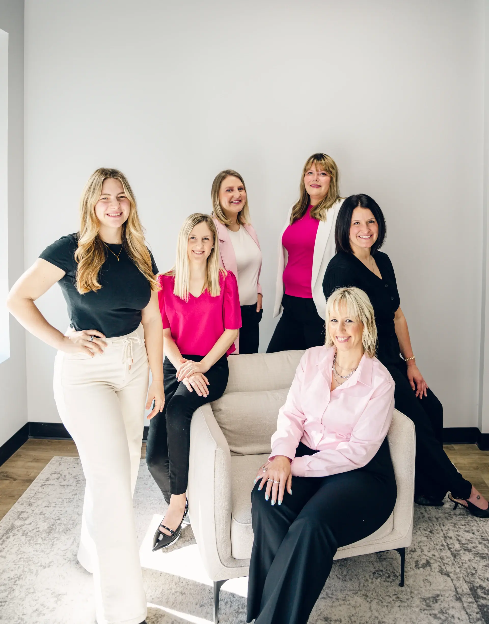fierce admin team sitting and standing together (1)