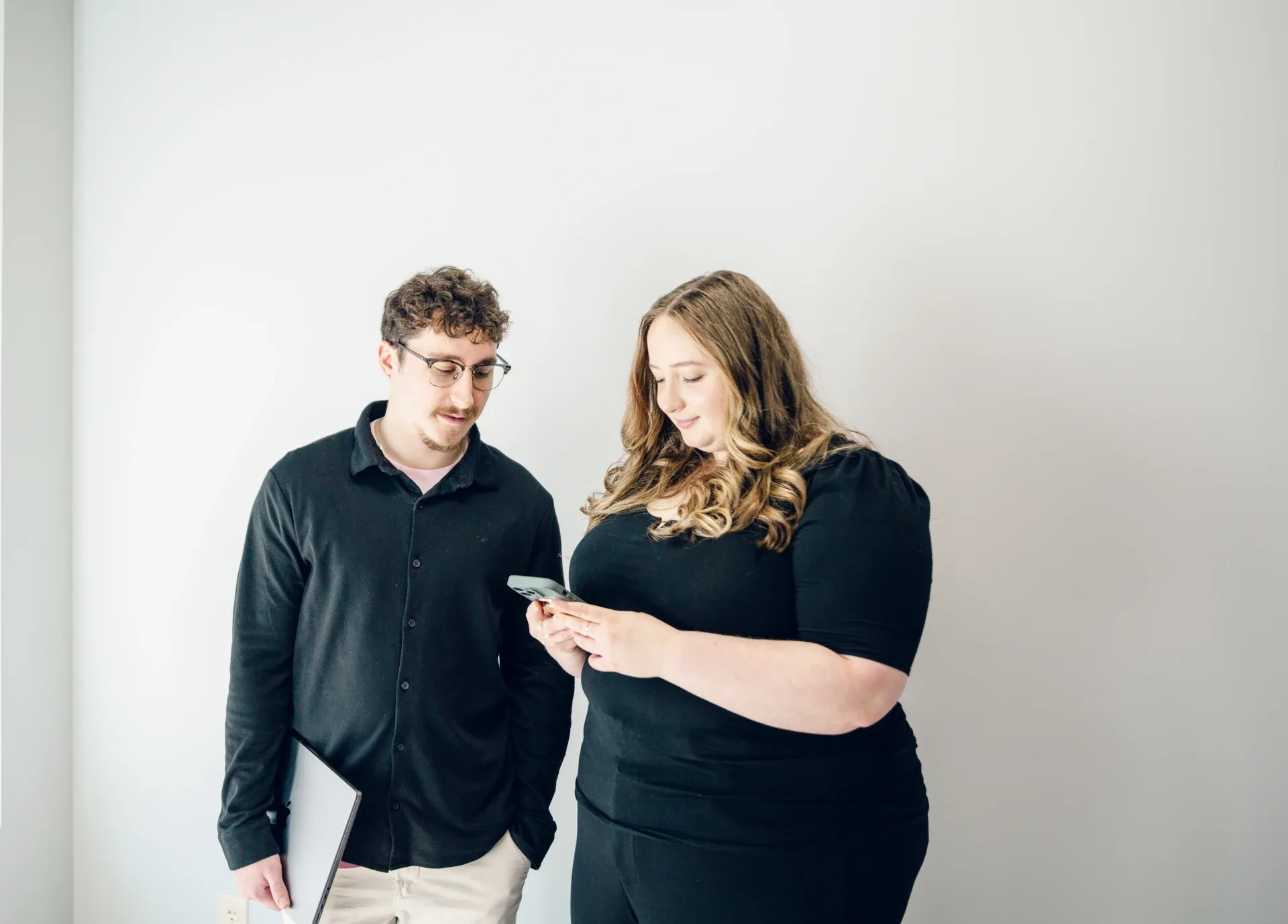 fierce seo team looking at phone