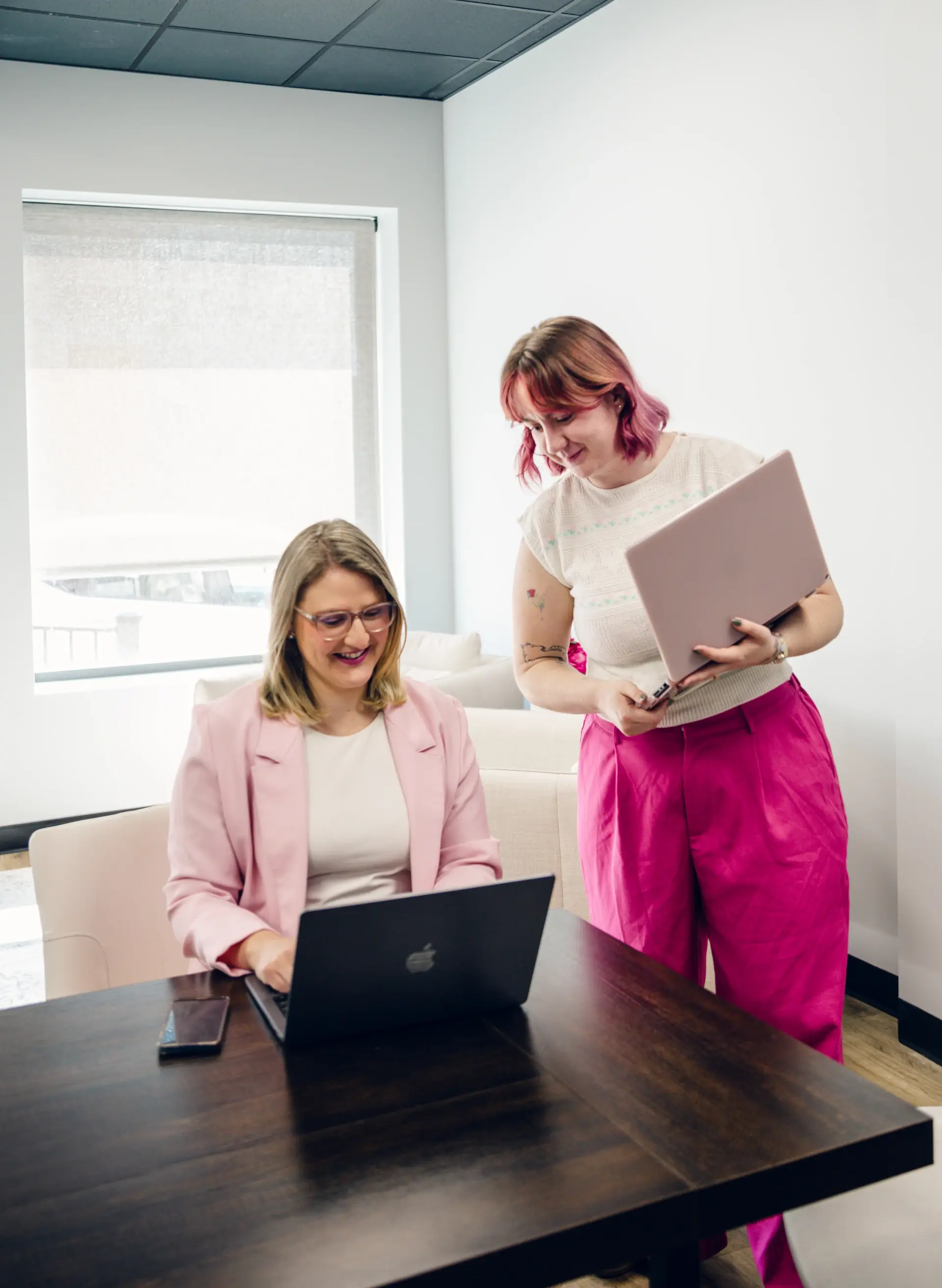 fierce email marketing team looking at laptop