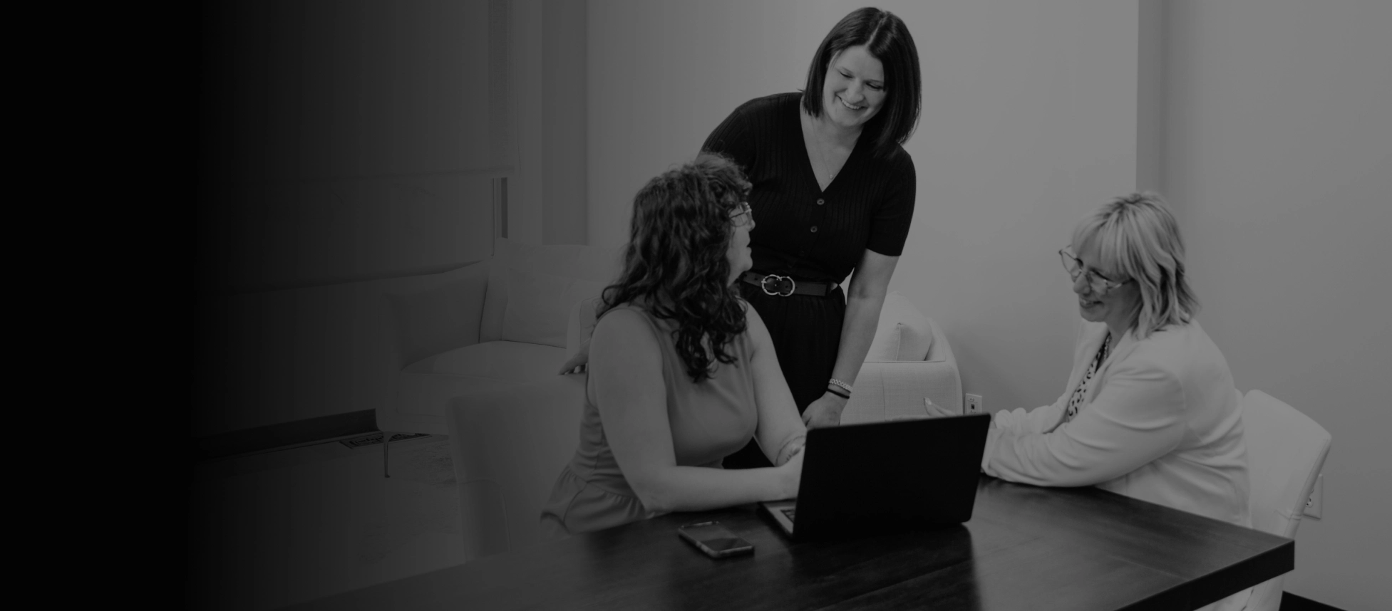 three women working marketing together gradient