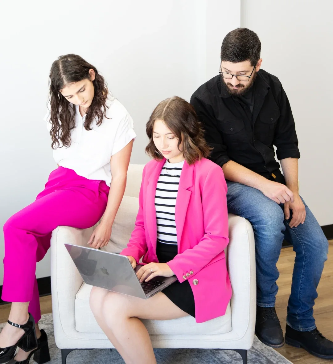 social media and photography workers sitting together