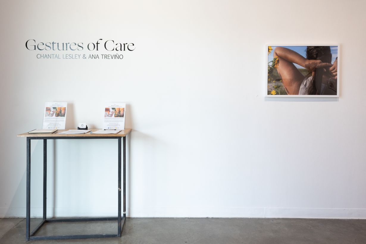 Gallery wall with artwork titled 'The Moon Knows Your Name' including a landscape photo with a circular moon overlay, a photo of a hand on wood, and two smaller framed photos.
