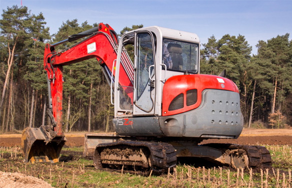 A red and white tractor with the number 172Z2 on the side.