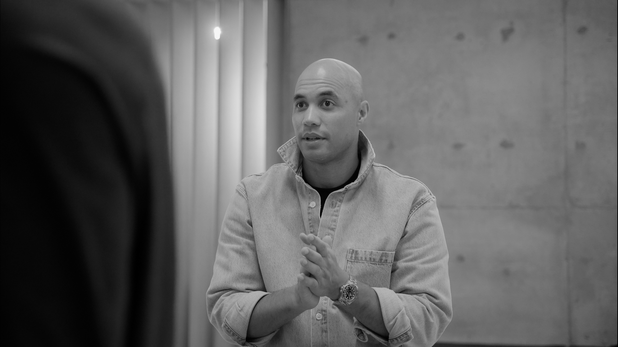 Dr Izzy sits in top Chiropractic Sydney studio ready to help solve some life long problems.