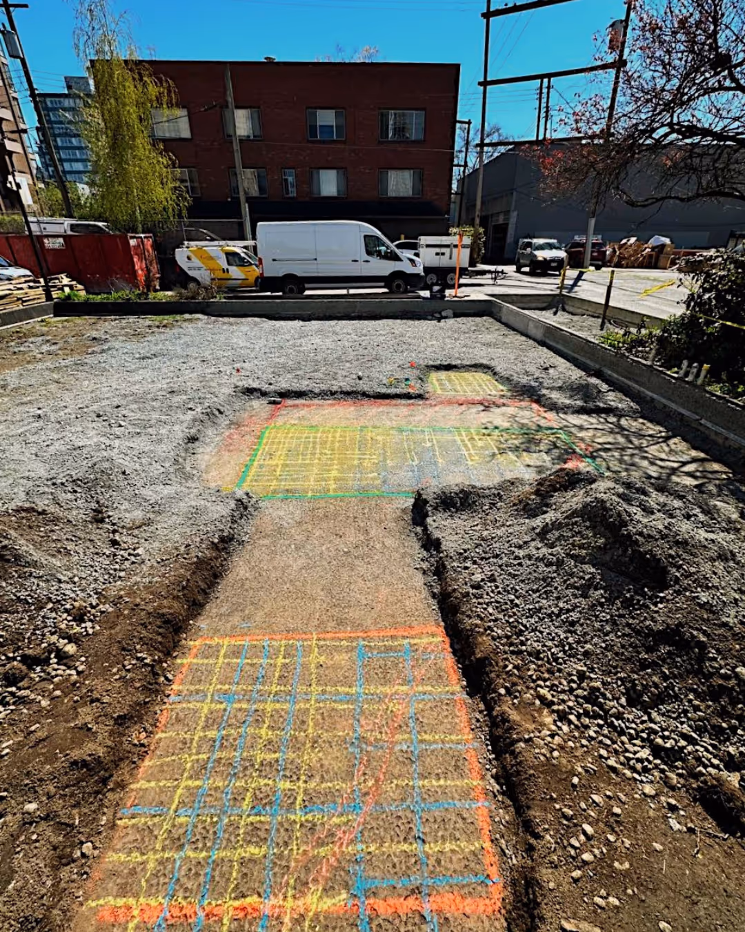 Close-up of a concrete cutting disc in operation on a construction site.