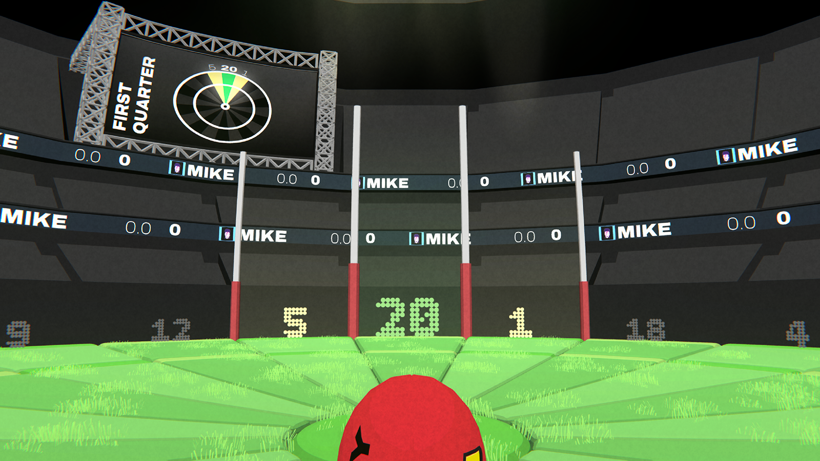 View from behind a red football on a green field looking toward goalposts with a scoreboard showing 'FIRST QUARTER' and numbers 5, 20, and 1 in the background.