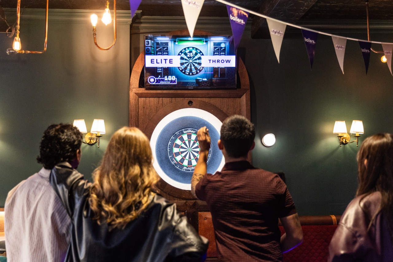 Players enjoying the auto-scoring of Ultradarts