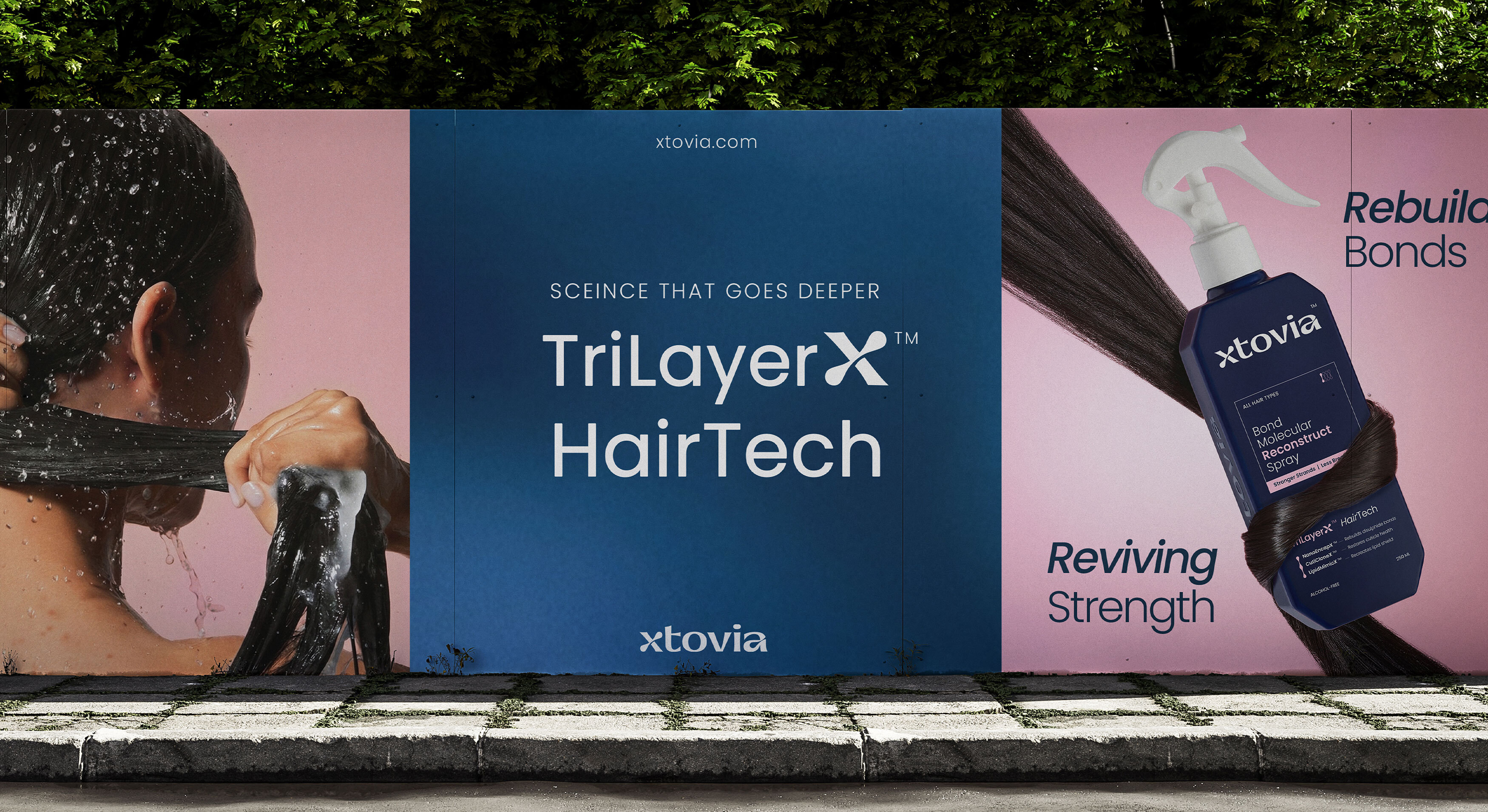 Large outdoor Xtovia billboard featuring TriLayerX HairTech branding with haircare visuals and bond repair messaging.