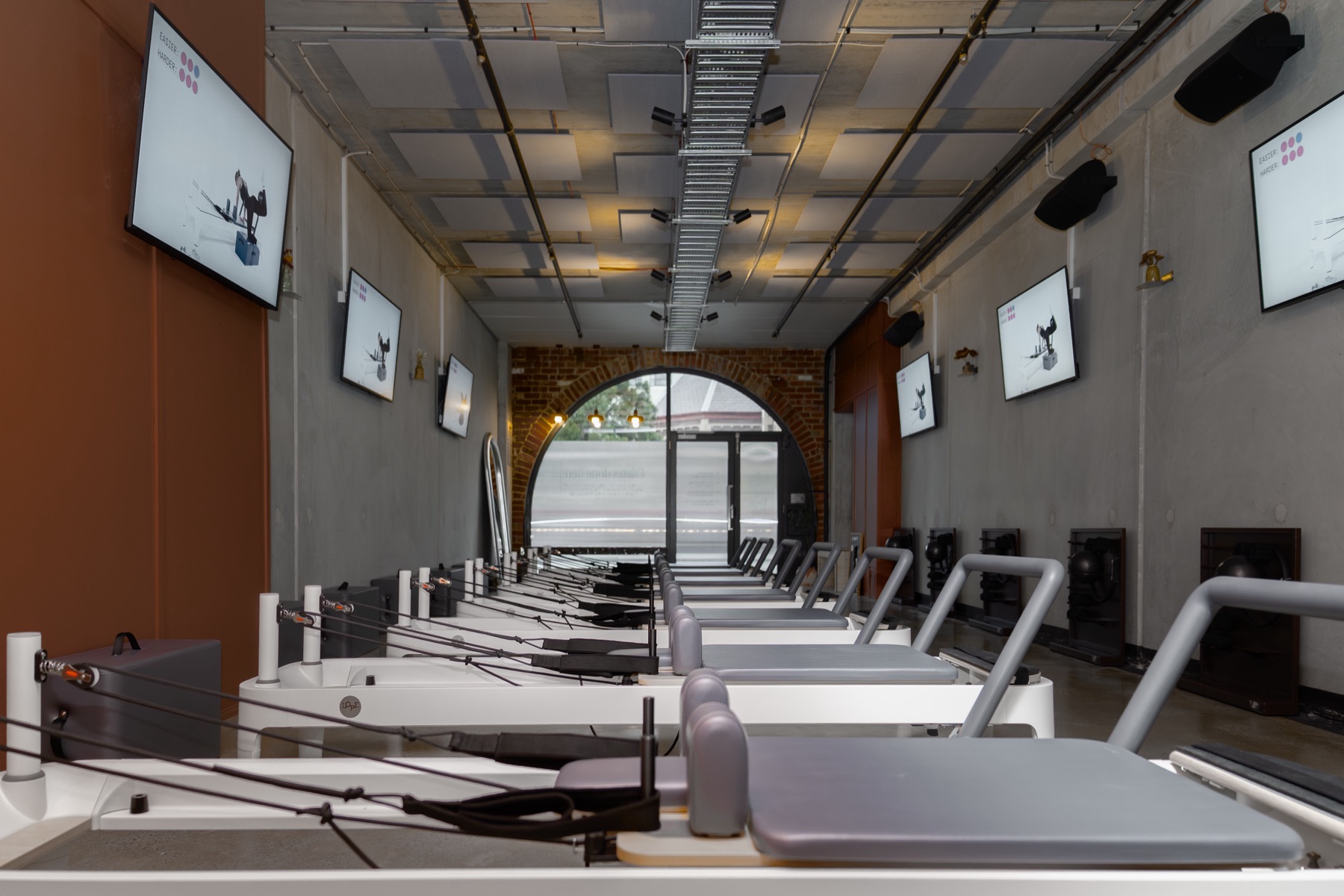 The Brunswick studio floor with reformers and screens