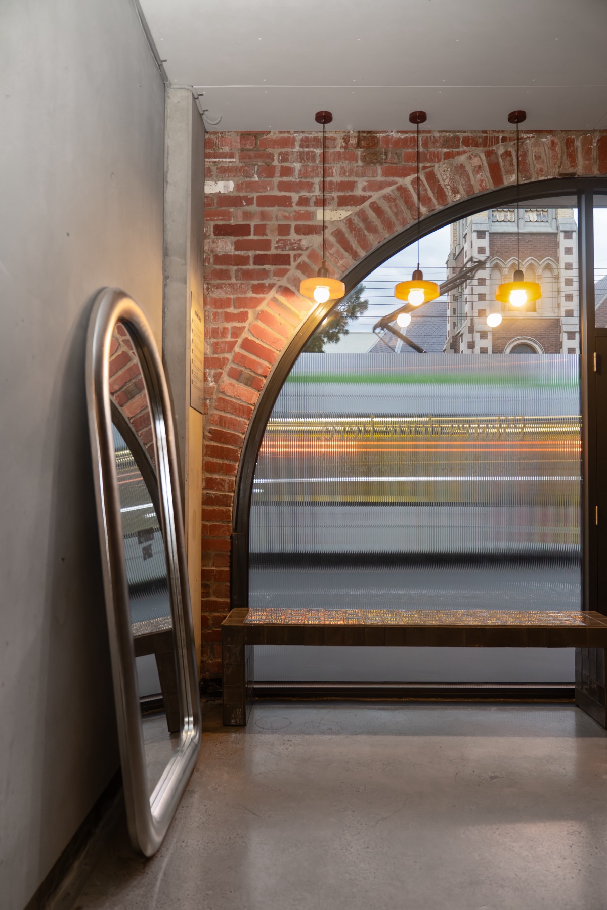 The entry bench and arched window at Brunswick