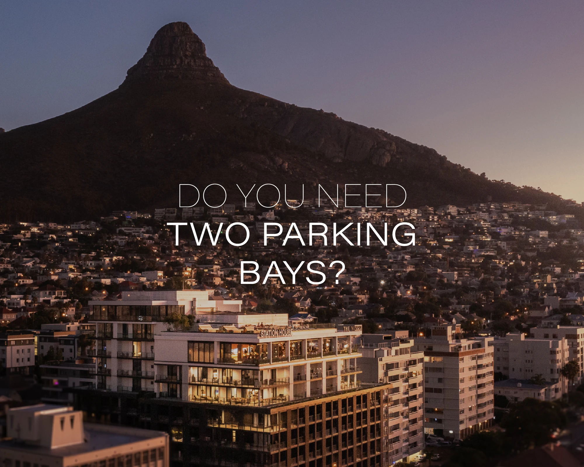 Sea Point apartment buildings at dusk beneath Lion's Head, Atlantic Seaboard, Cape Town