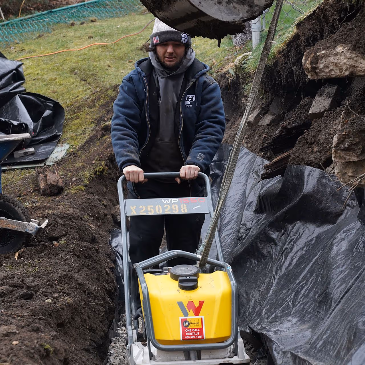 Hardscaping crew from A&J Lawn Pros LLC installing patio in Greater Pittsburgh, PA
