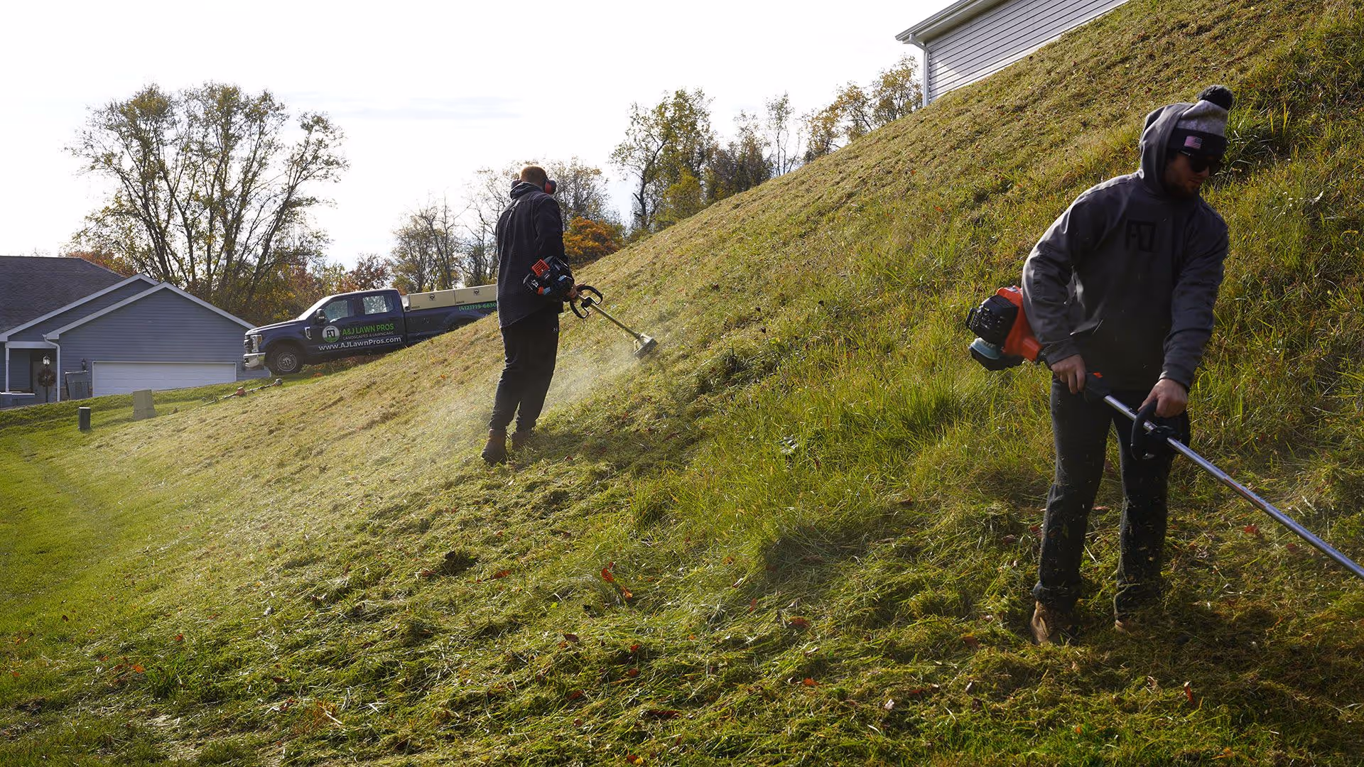 commercial property lawn maintenance crew by A&J Lawn Pros