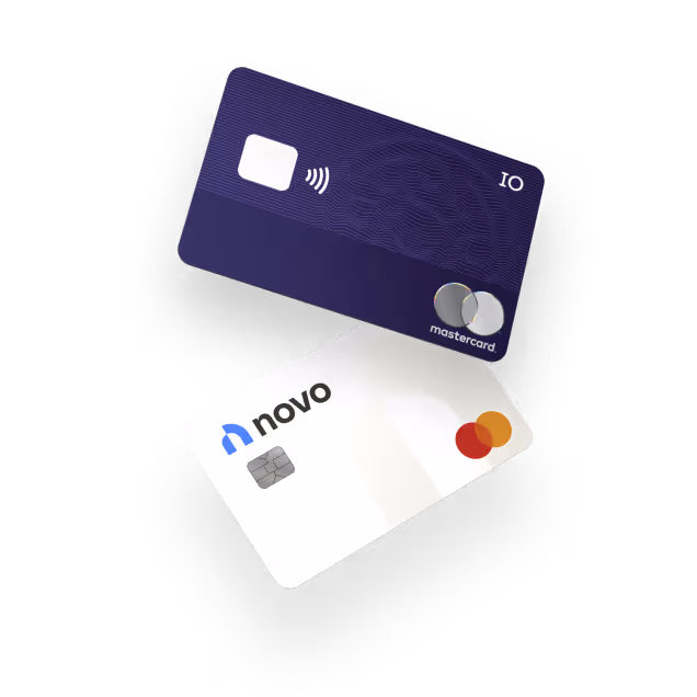 Two credit cards overlapping, one purple Mastercard with chip and contactless symbol, and one white Novo Mastercard with chip and logo.