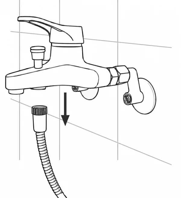 Déconnexion du flexible de douche sous le mitigeur avant l’installation du filtre douche.