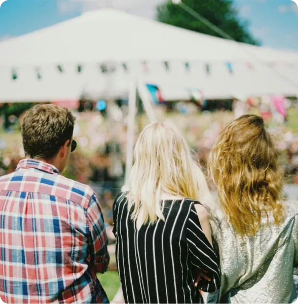 people at a tent party