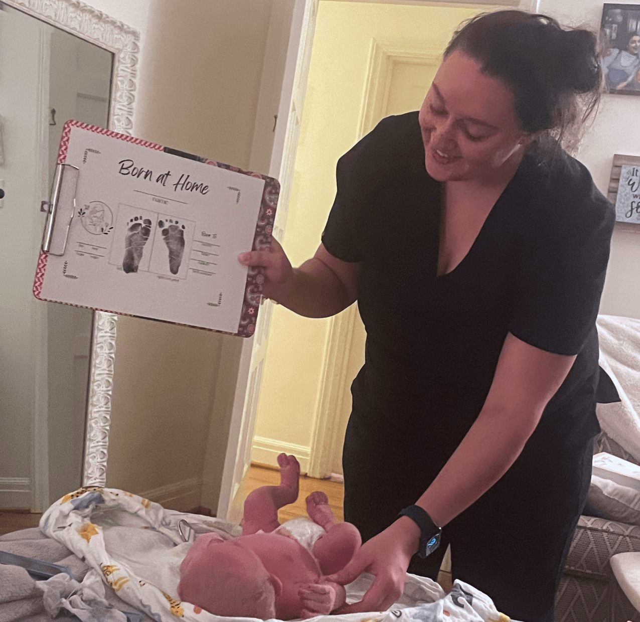 Midwife Foot printing baby