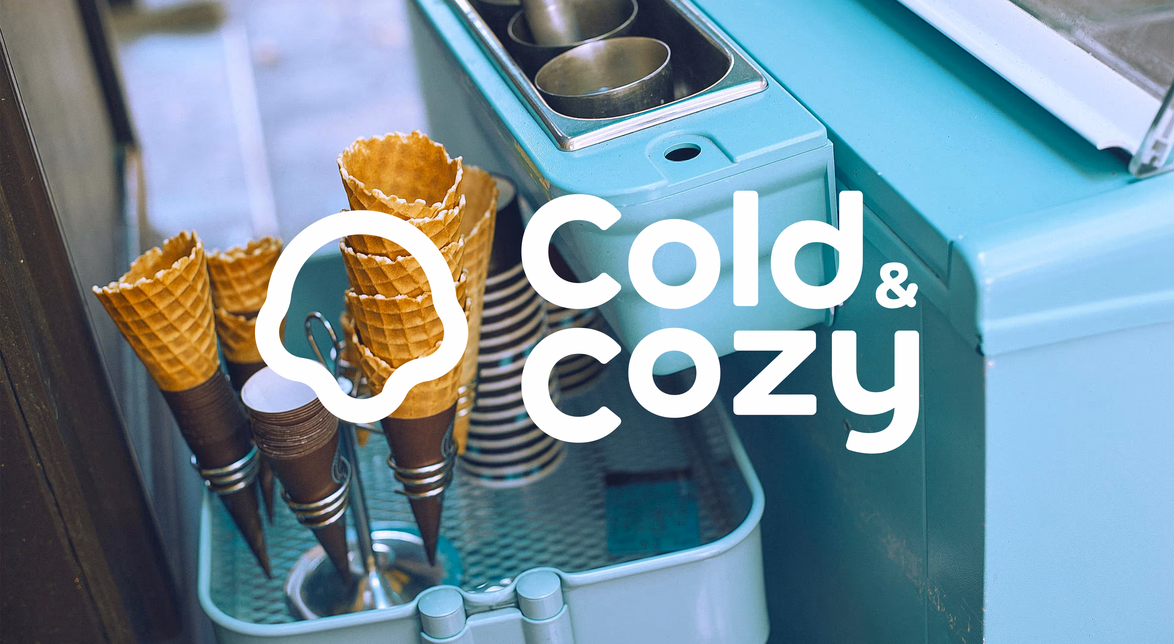 an intro image showing an icecream stand with cones and Cold&Cozy logo over the image