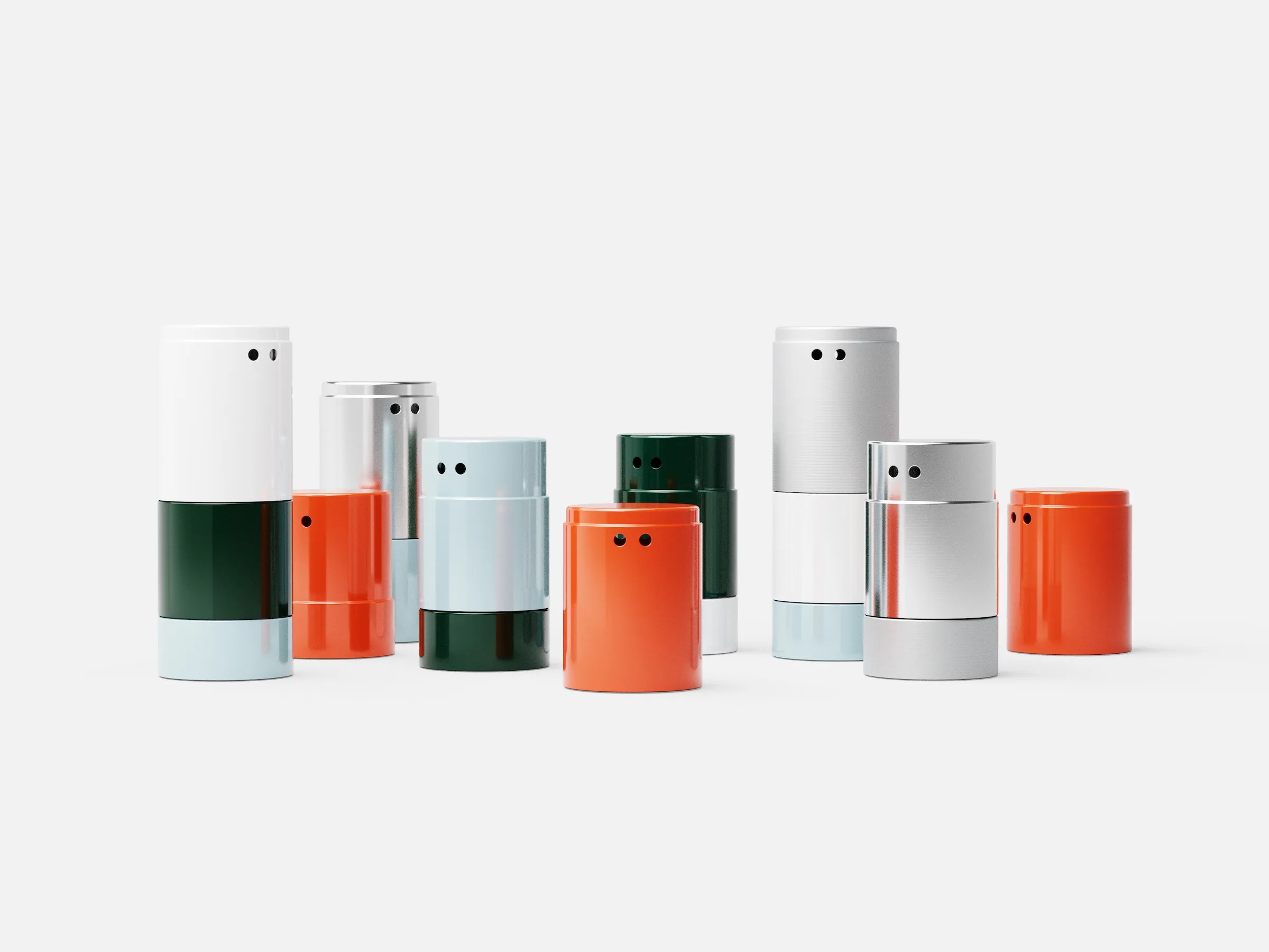 The Peepers stools stacked in white, green, orange, chrome and light blue