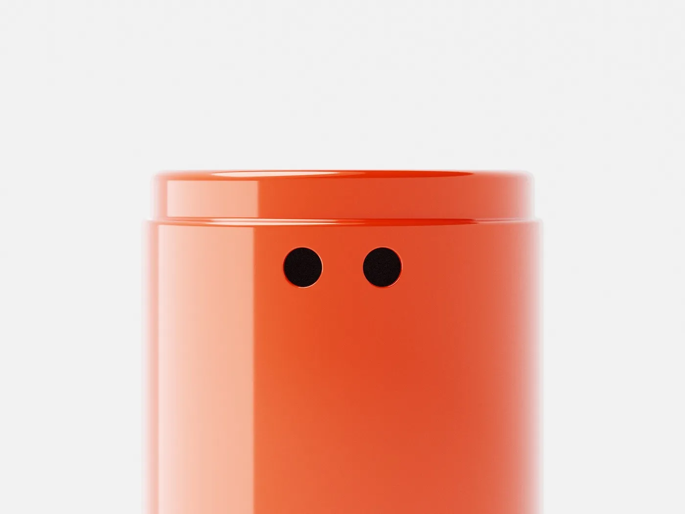 Close-up of an orange Peepers stool with its two eyes