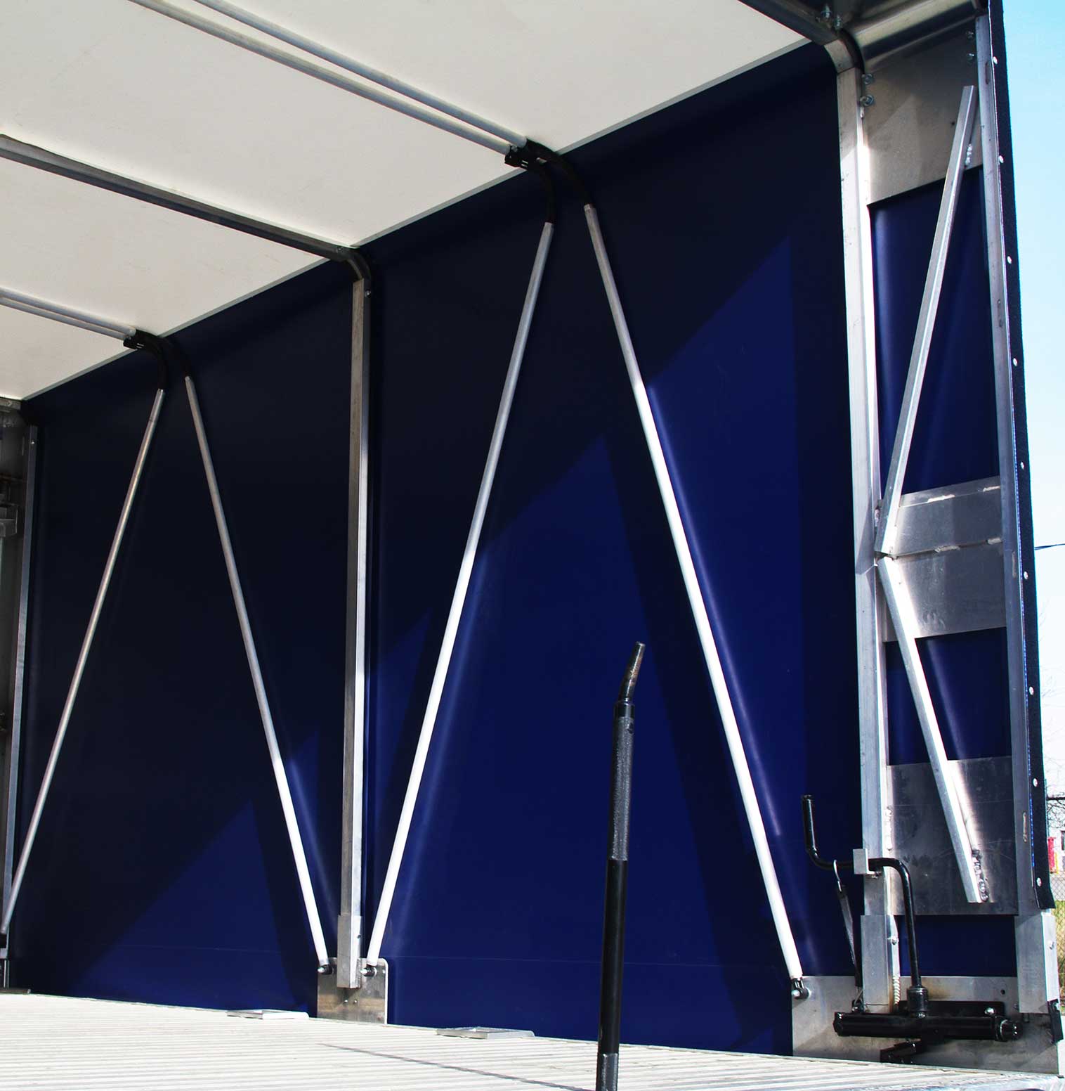 Right side bars of Zippy Tarp inside the truck.