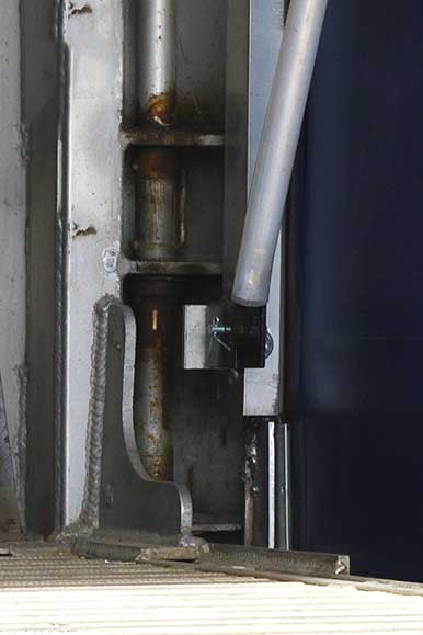 Bottom left bracket of a Zippy Tarp in use.