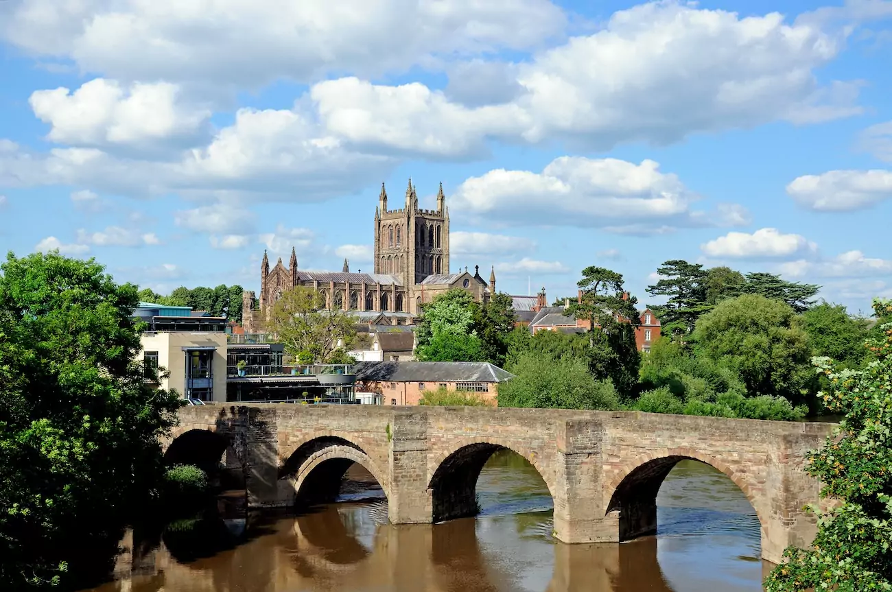 A bridge going over a river in Hereford.
