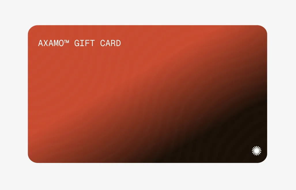 Axamo™ gift card with a gradient background from red to black and a small white circular emblem in the bottom right corner.