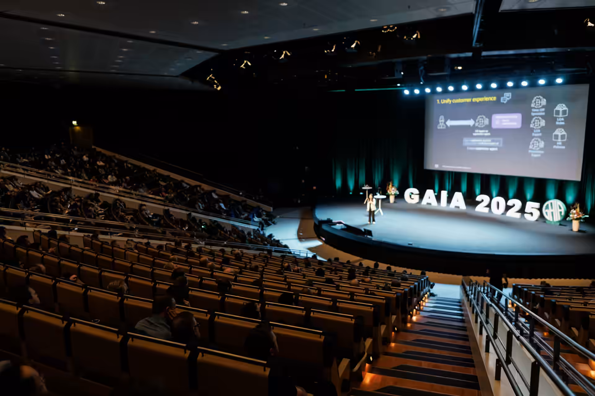 A photo showing a speaker in front of the audience in the Congress Hall at the 2025 GAIA Conference. Photo by Anton Kozyr.
