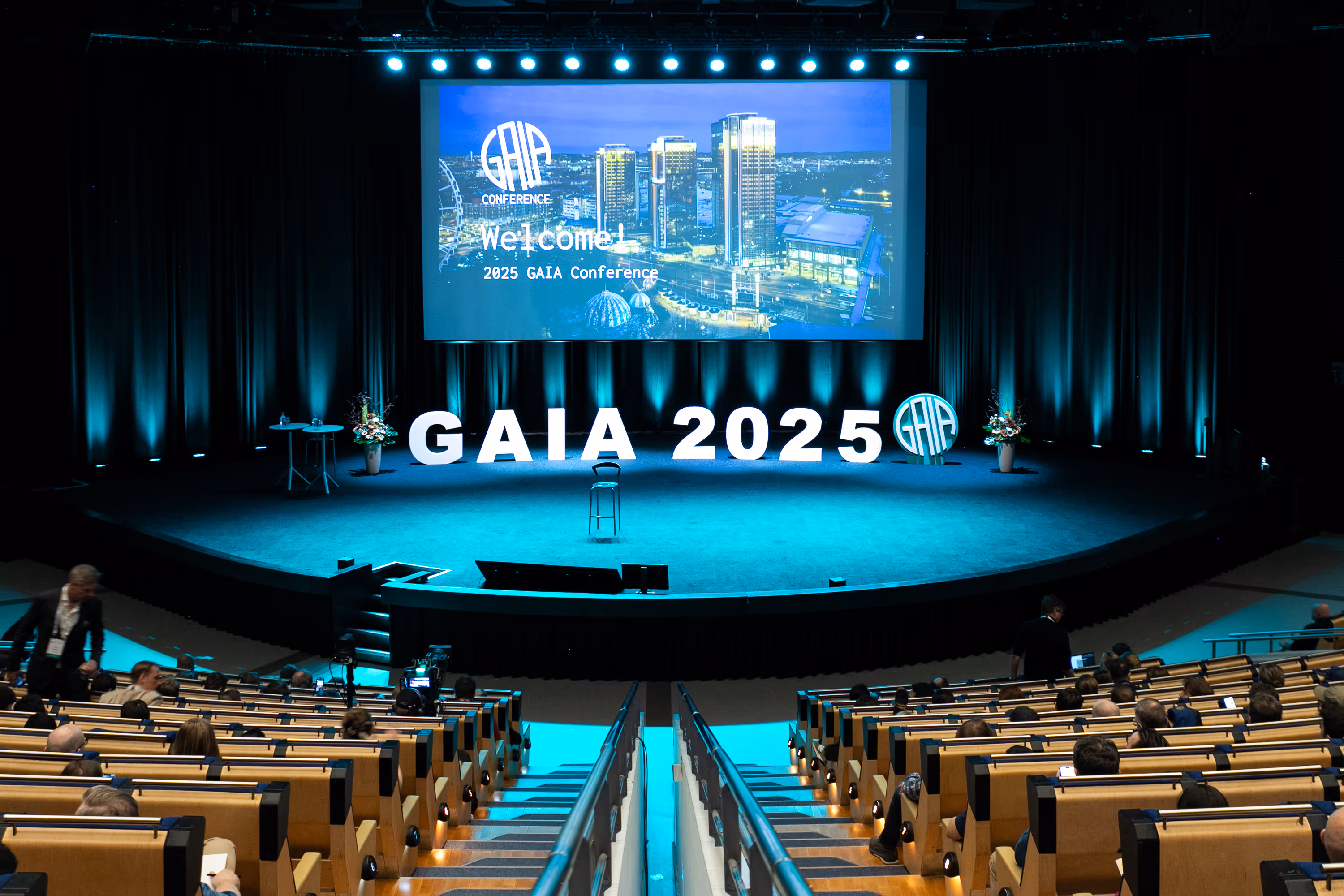 A photo showing the empty stage in front of the audience in the Congress Hall when the 2025 GAIA Conference was about to start. Photo by Kef Film.