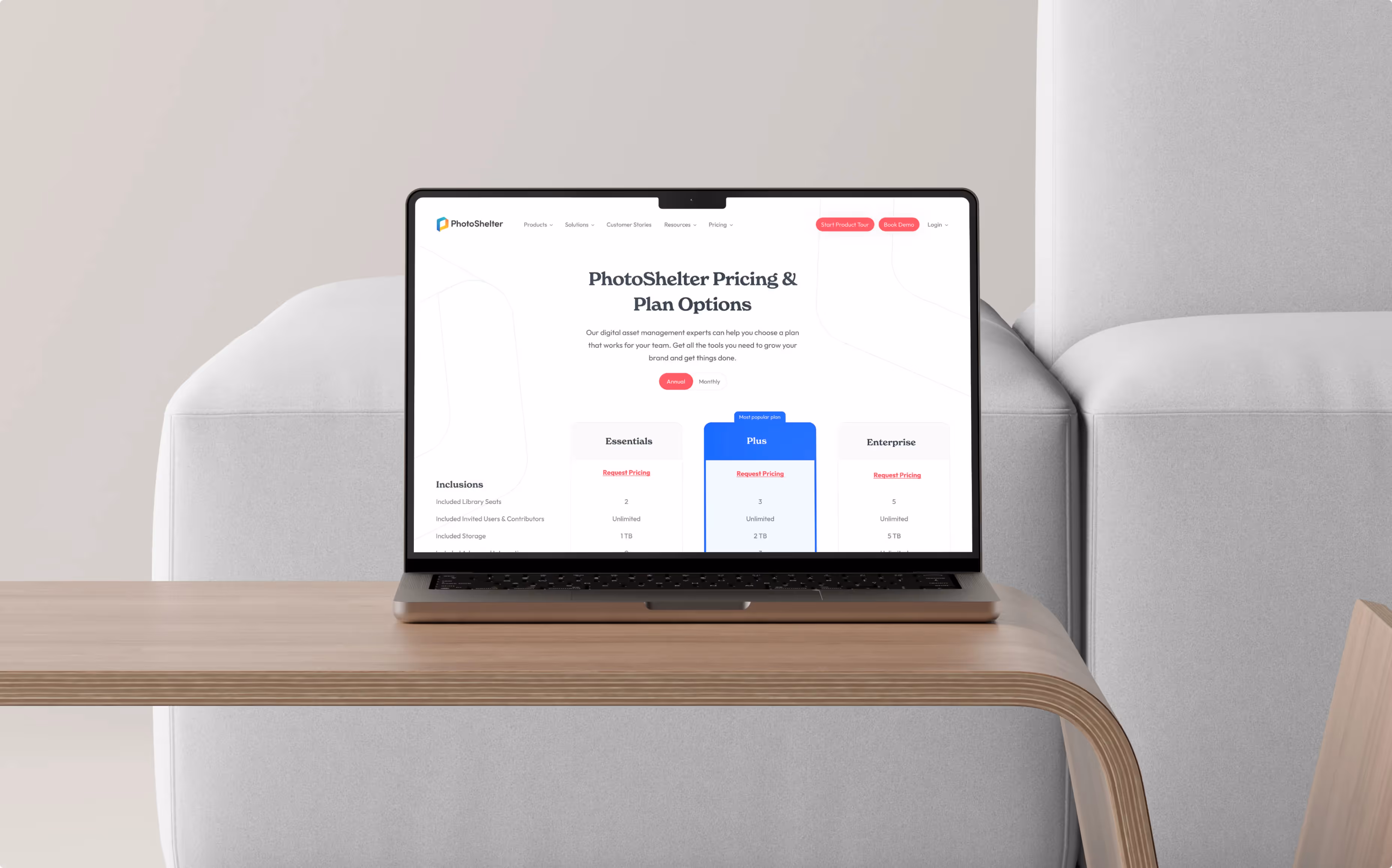 A laptop with Photoshelter's pricing page on the browser