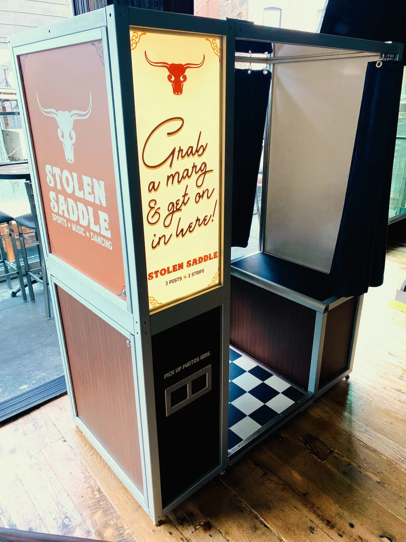 Woodgrain photo booth at Stolen Saddle bar in Chicago