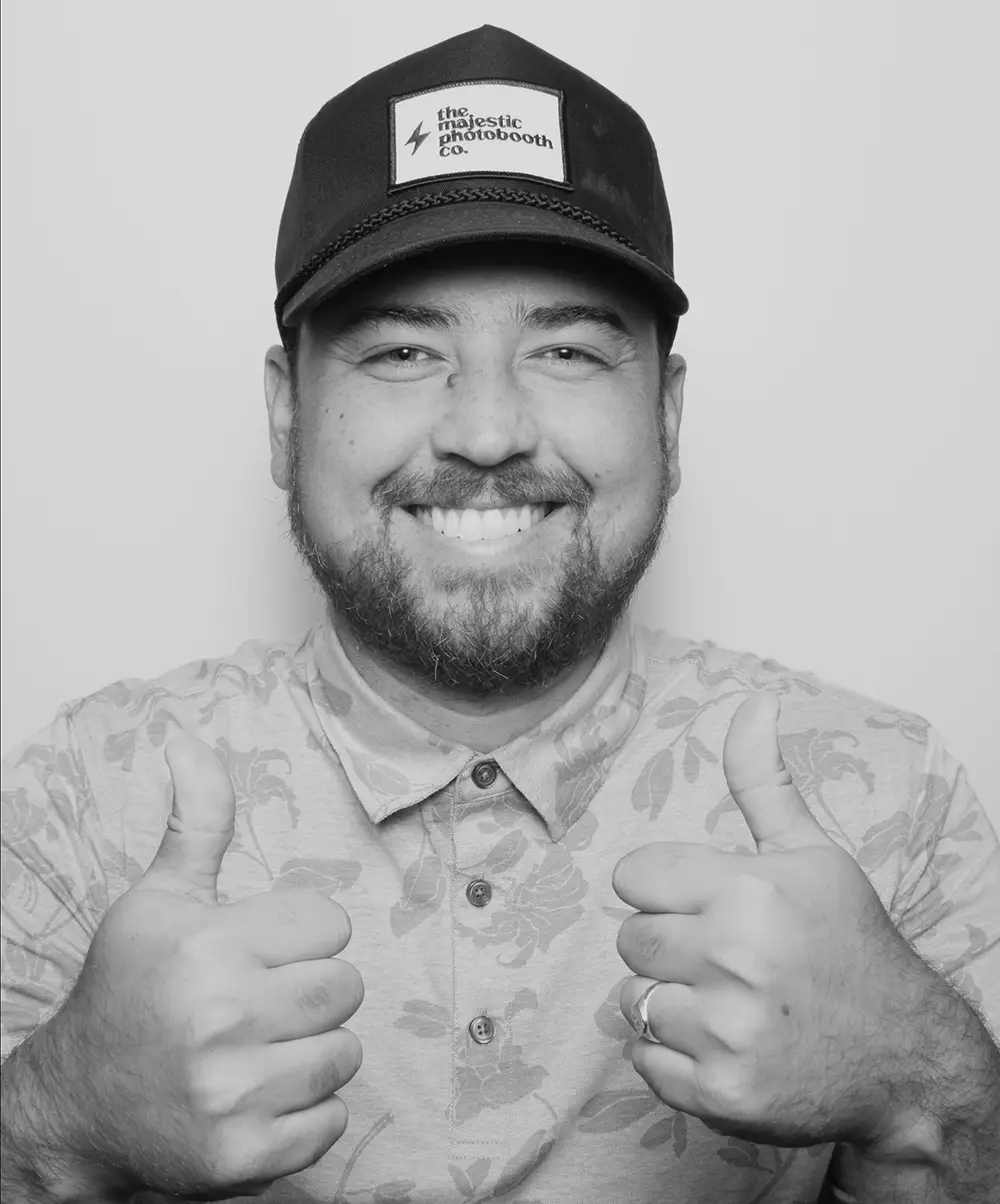 Man posing in a photo booth