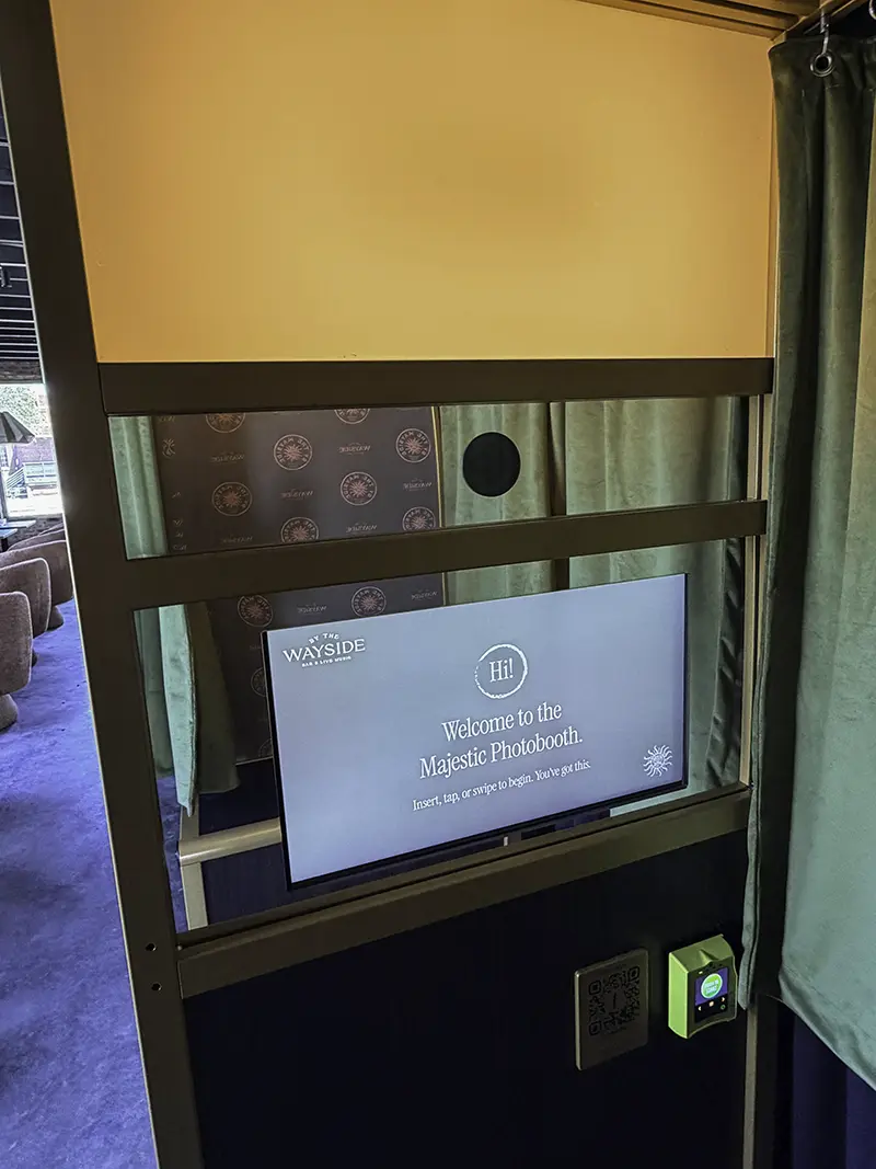 inside of a custom gold frame photo booth