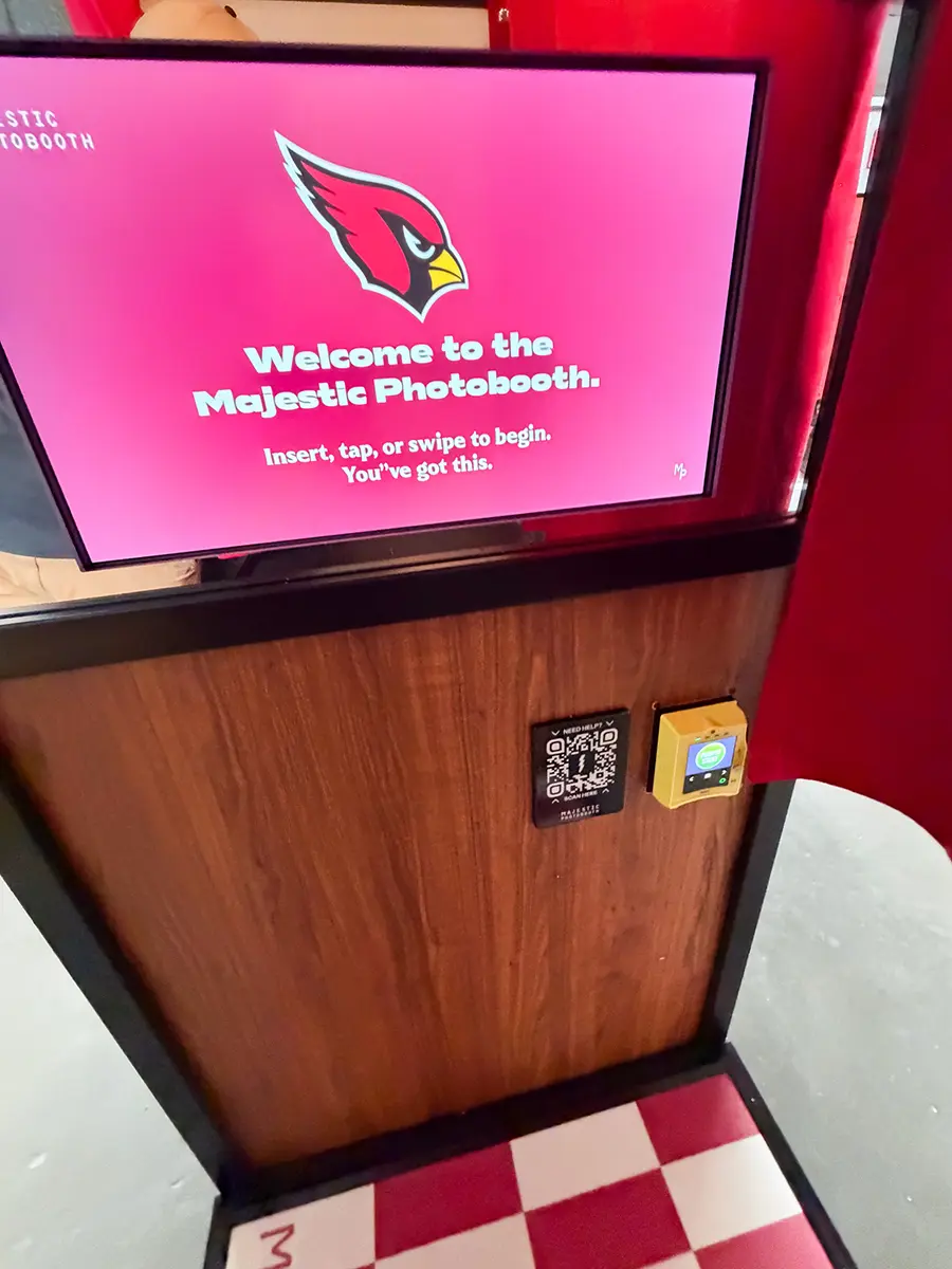Arizona Cardinals branded welcome screen inside the Majestic photo booth, with tap to pay reader and help QR code