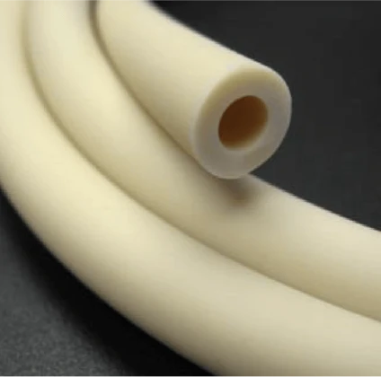 A close-up image of a white, flexible tube with a circular cross-section