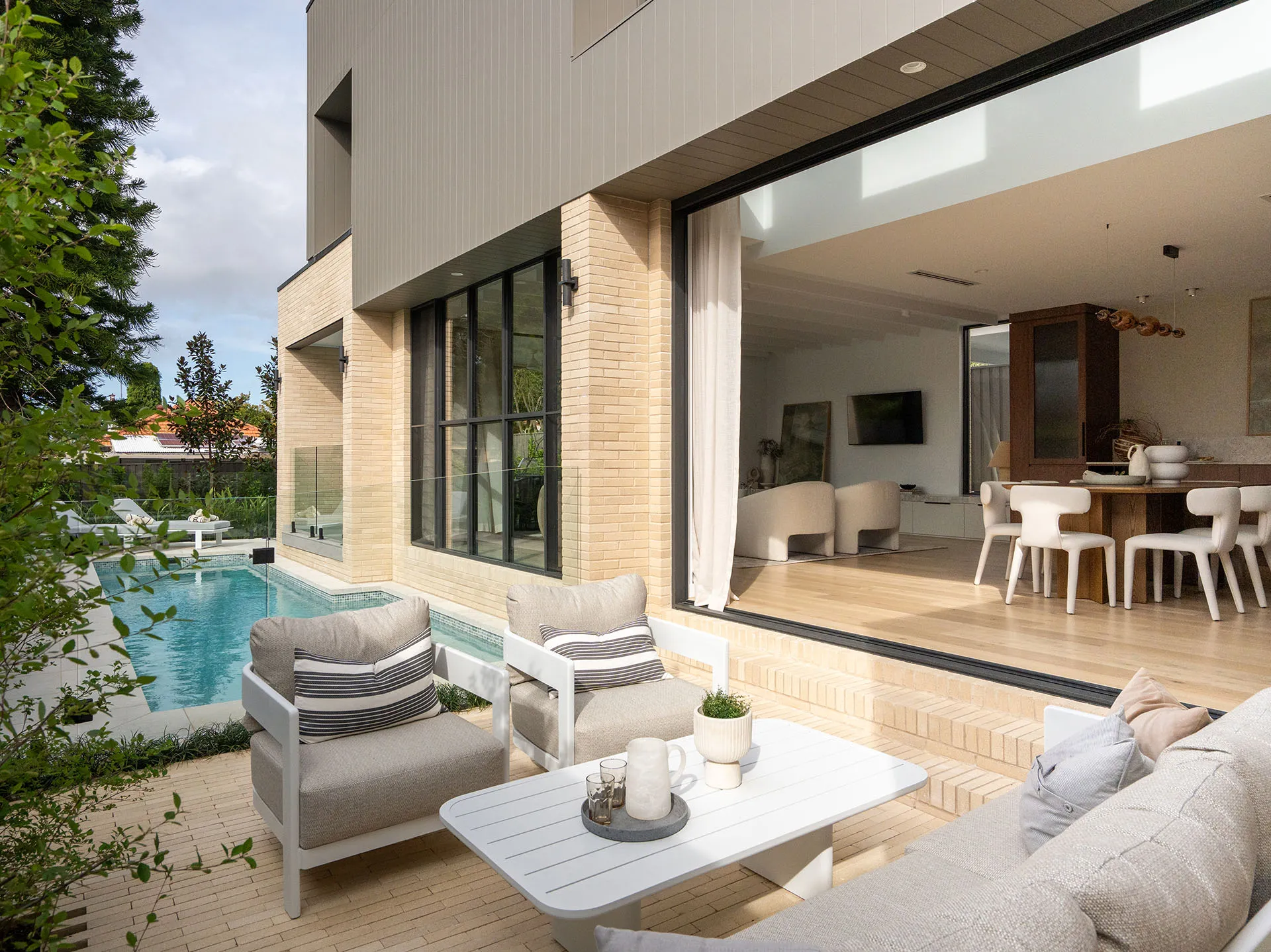 Seamless indoor-outdoor living extends the experience, made for entertaining or simply unwinding together.